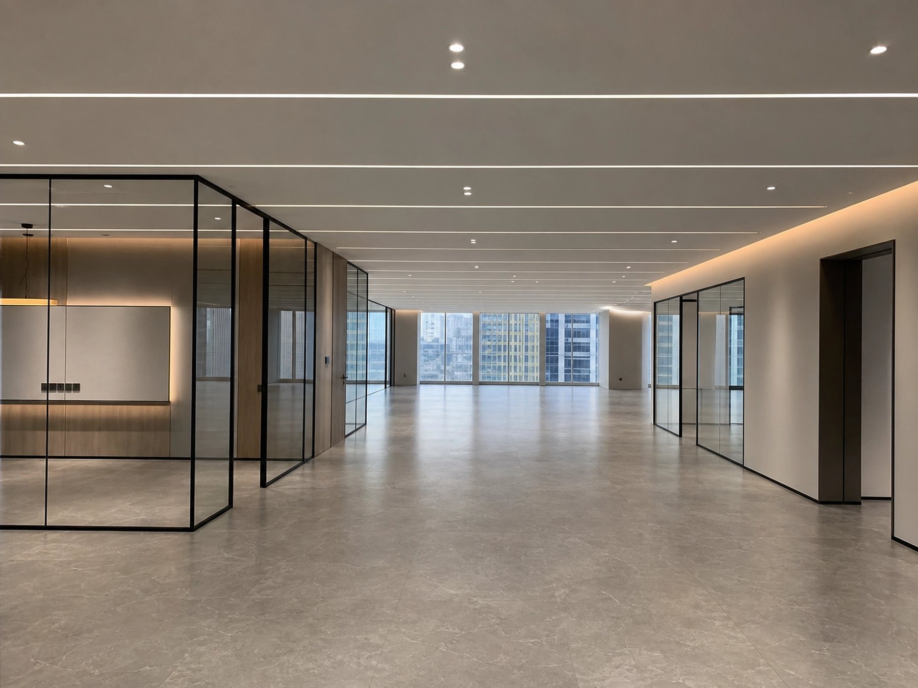 The same office floor after fit-out, glass partitions and new ceiling